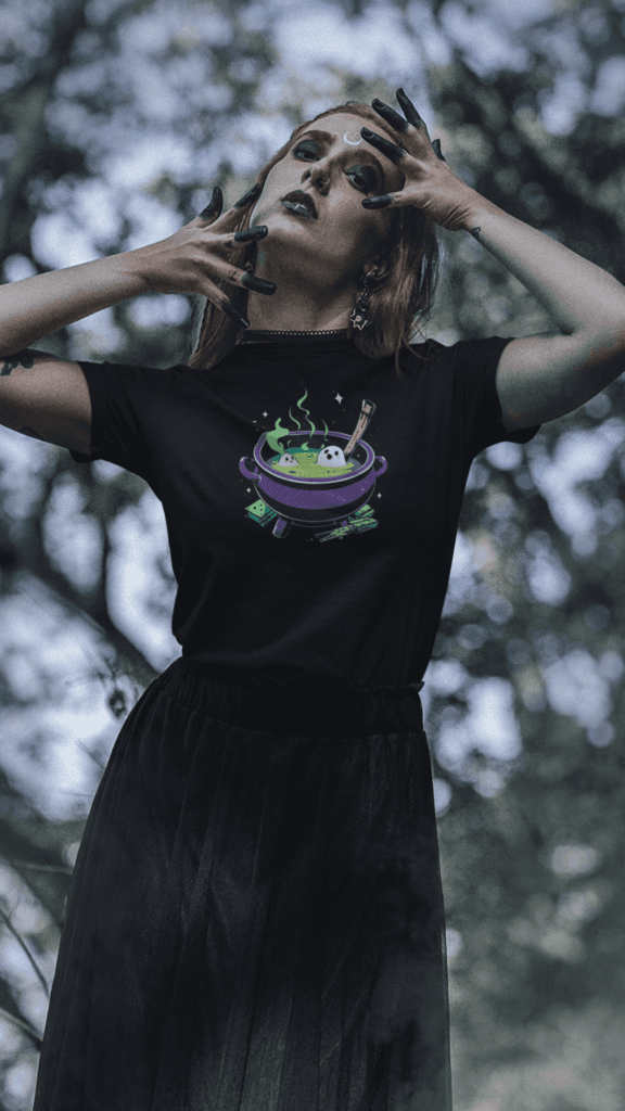 MotasTheCat black T-shirt featuring a spooky Witch's Brew recipe print design